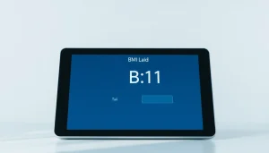 Calculate your BMI calculator using an interactive digital device showcasing a user-friendly interface.